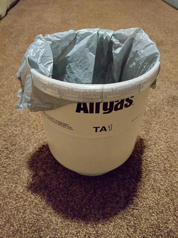 Bag holder/Lip protector for air tank bin