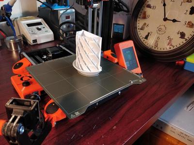 Half Helical rain/radiation shield for weather sensors