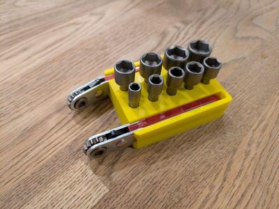 Holder for 2 mini wrenches and 9 x sockets set