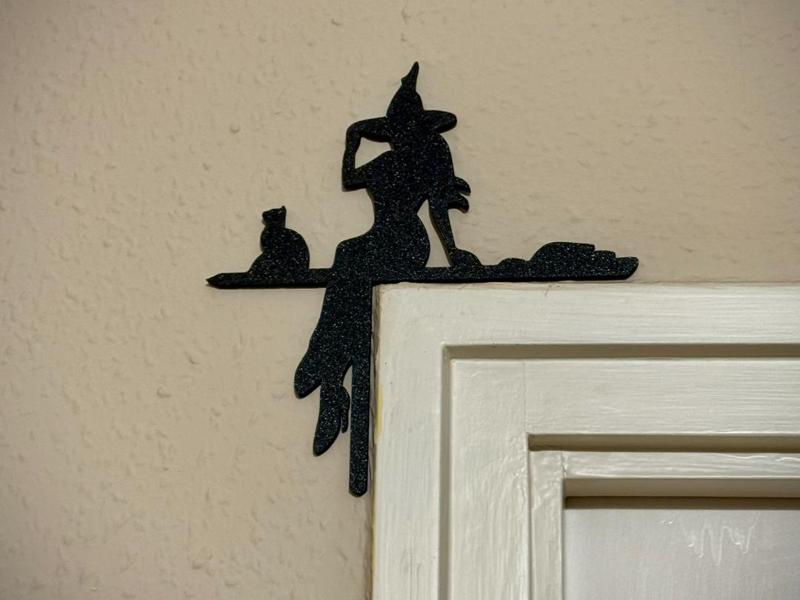 Girl and cat halloween door decor