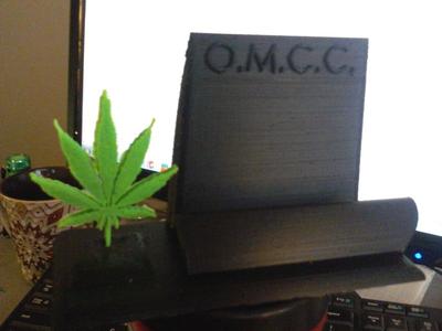 Oregon Medical Cannabis Clinic business card stand
