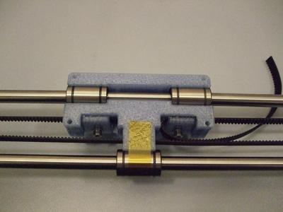 Reprappro Mendel Tricolour vertical x-carriage mod with beltclamp (Tech3D hotend compatible)