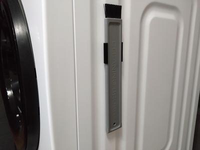Filter brush magnetic mount