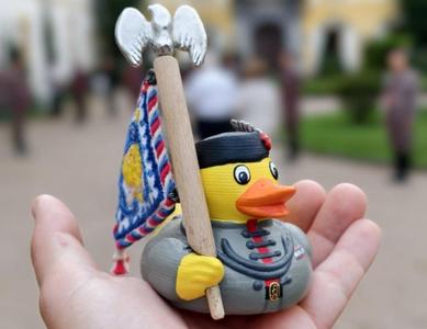 Sokol - Bratr Kacer (Brother Duck) with flag