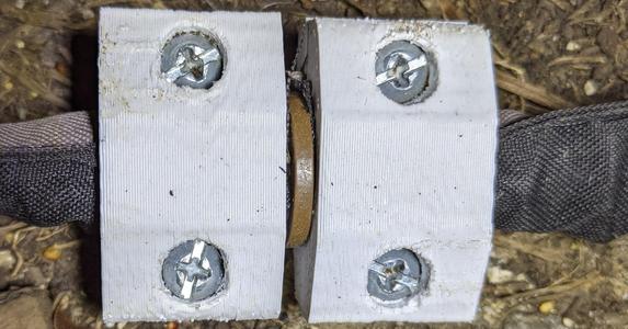 Bracket for fabric soaker hoses