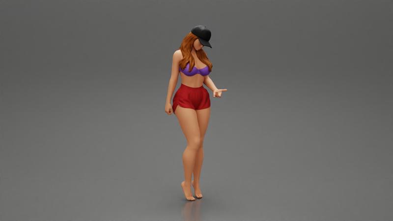 Sexy Girl standing in Cap and Shorts With Posing