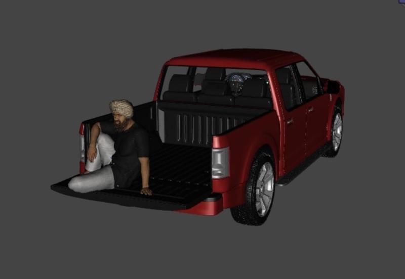 man sitting at pickup truck