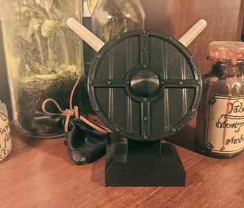 "A pen is mightier than a sword" pen holder