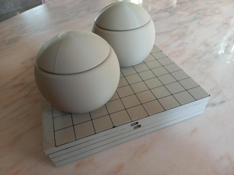 Go game bowls and stones
