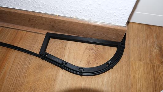 Protection for optical fiber network cable for laying around corners