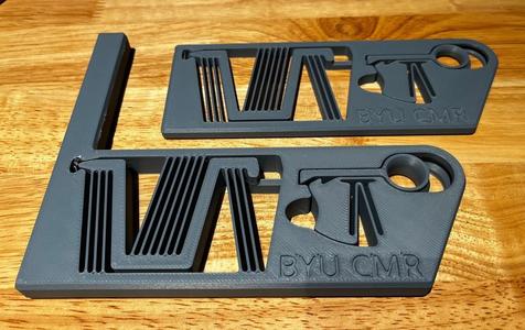 One-Piece Compliant Mechanism Disk Launcher With Hopper