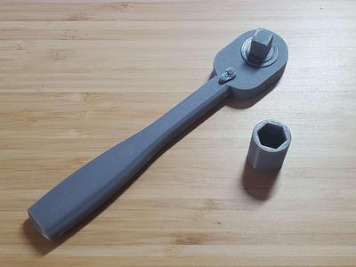 Self-Orienting Ratchet Socket Wrench