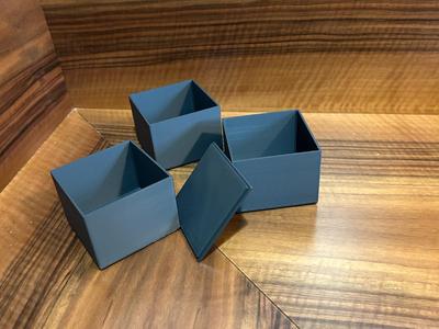 Stacking storage boxes with a lid