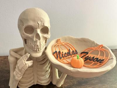 Halloween skeleton with a bowl