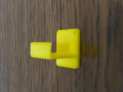Wall or door hook without frills.