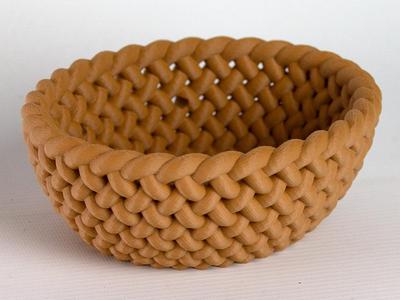 Basket in braided design for decoration