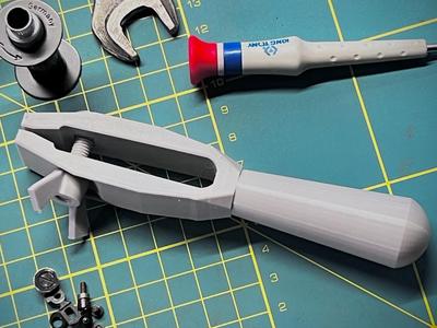Hand-held mini vise