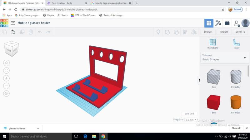 A phone and glasses holder