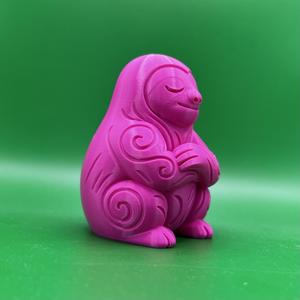 Sloth sculpture elegant swirl lines