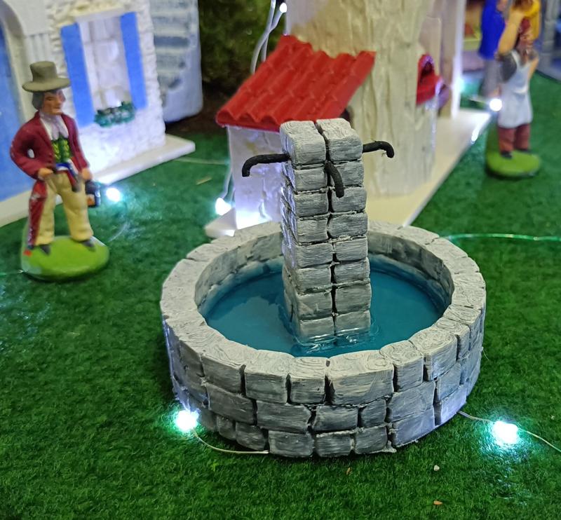 Stone fountain in the Santon village