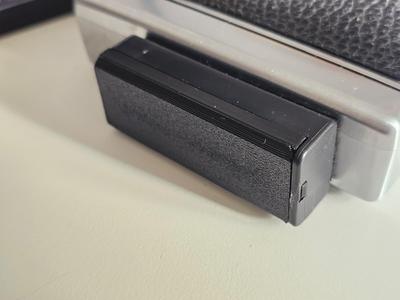 Polaroid SX-70 battery cover
