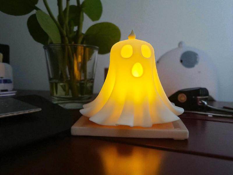 Glowing candle ghost