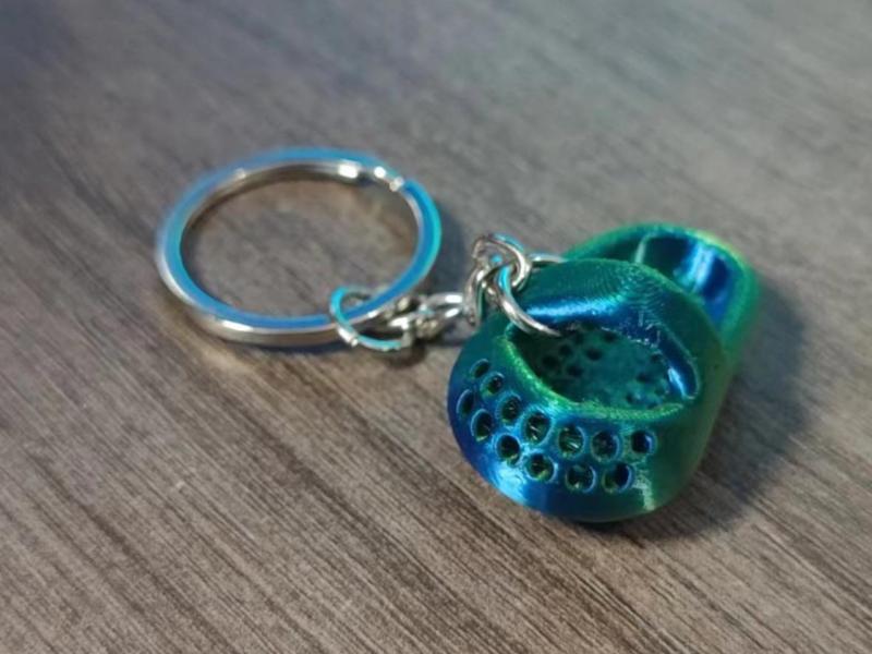 Baby hole shoe keychain