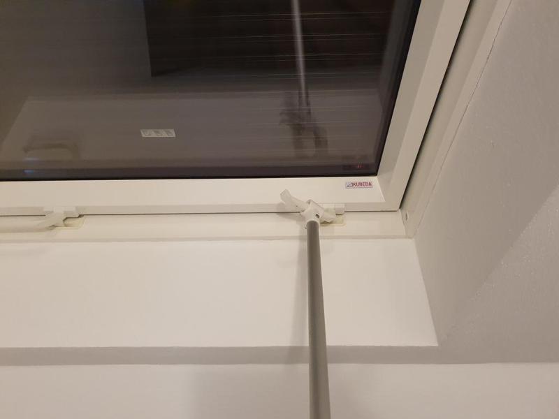 Window handle remote opener tool with wall-mount