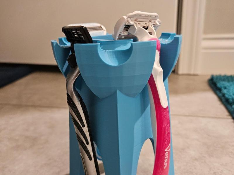 Multirazor holder for shower