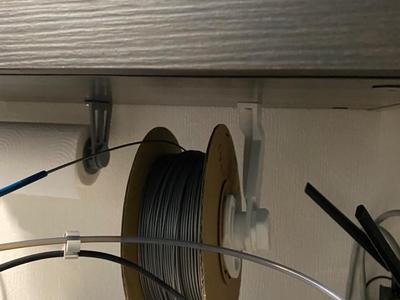 Ball bearing spool holder with angle bracket