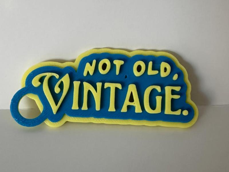 Not old, Vintage. Keychain, tag, name tag