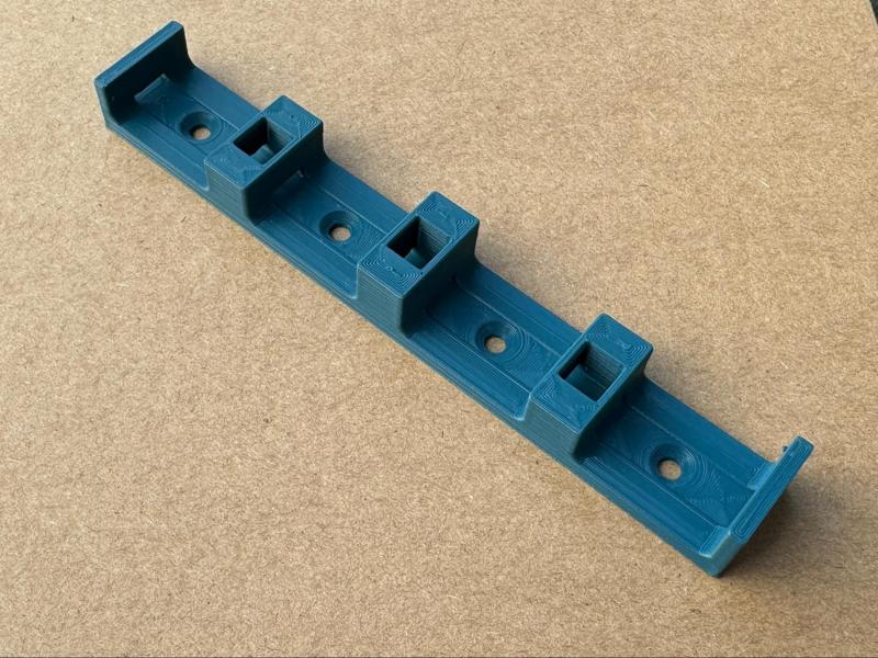 Multiple cable support wall holder