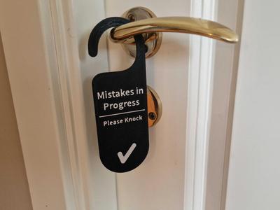 Mistakes in Progress – Funny Door Hanger