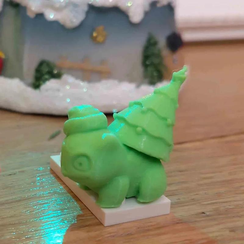 Christmas bulbasaur with tree and hat ornament on 4 lego studs   
