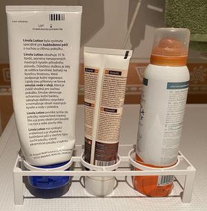 Holder for tubes, creams and other fiddly bottles
