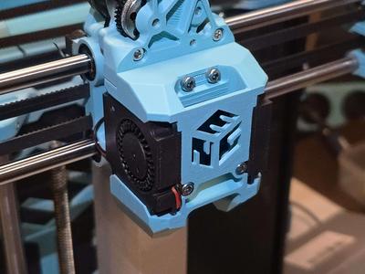 Ender 3 NG v1.2 medium 4010 tool head fan duct with ENG logo fan grill, fixed bridges, and no spacer