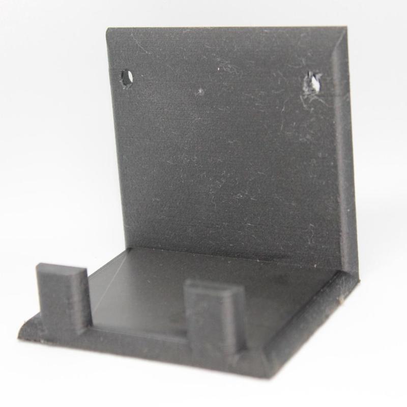Mobile holder for hanging on the wall