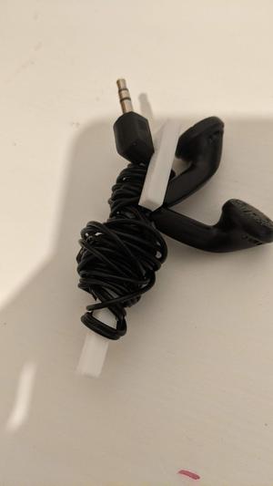 Cable earbuds earphones holder for traveling