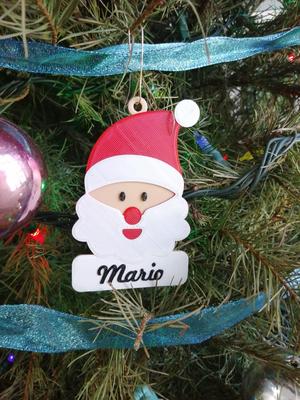 Christmas tree decoration in the shape of santa claus' face