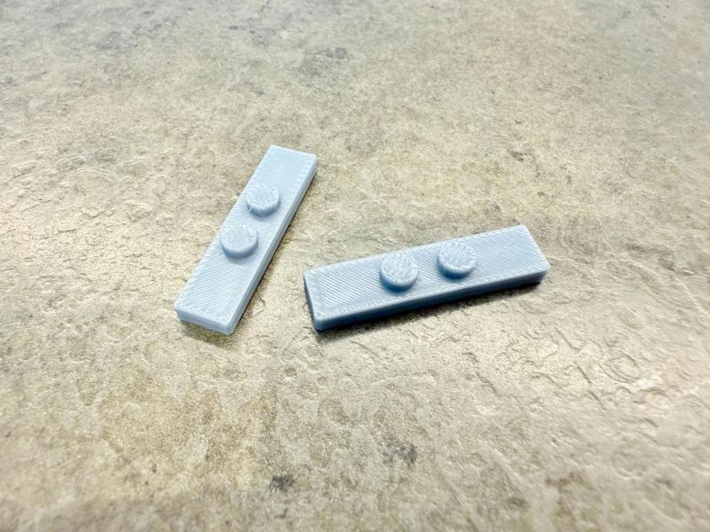 Brick - 1x4 plate with 2 knobs