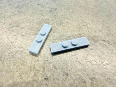 Brick - 1x4 plate with 2 knobs