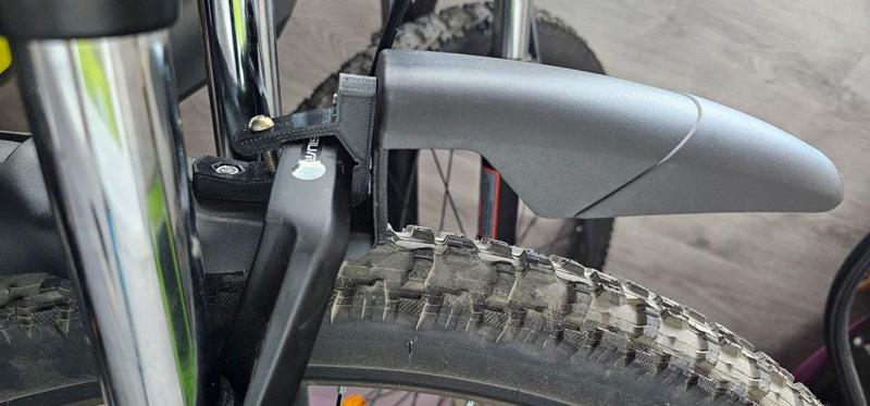 Bicycle front wheel fender mount clamp