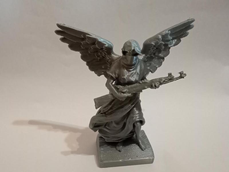 angel with bandana and ak-47