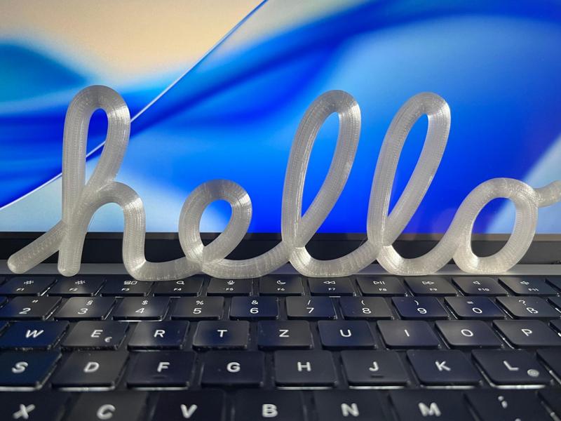 Apple Hello Sign Liquid Glass edition