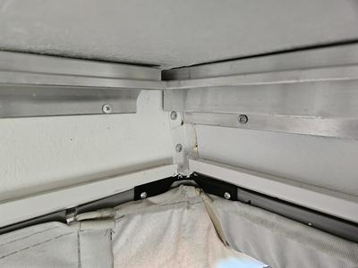 Corner reinforcement for popup camper (interior canvas side, blocks mosquito ingress)