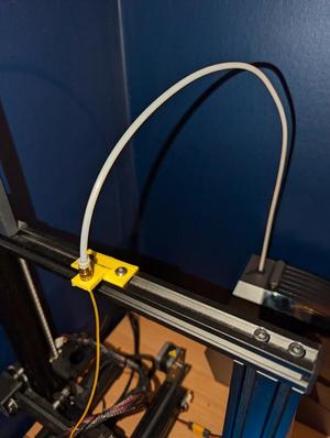 Bowden tube fitting holder for feeding a direct drive