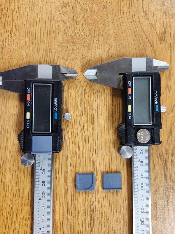 Slide battery cover for digital calipers