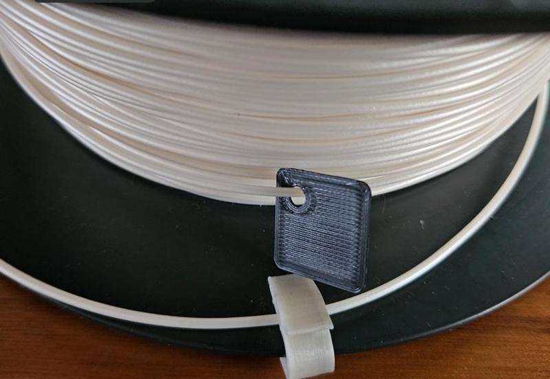 Étiquette anti-enchevêtrement pour bobine de fil 3D