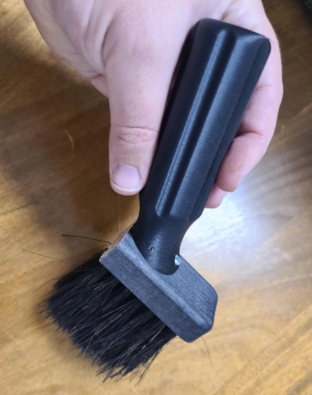 Angled reinforced handle /grip for brushes