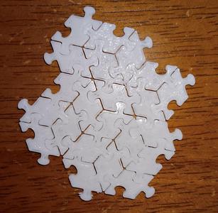 Interlocking rhombus tiles